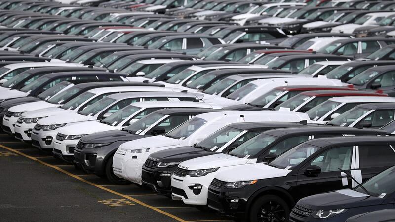 New Land Rover cars are seen in a parking lot at the Jaguar Land Rover plant at Halewood in Liverpool, northern England, September 12 , 2016. REUTERS/Phil Noble - LR1EC9C0TGE2R