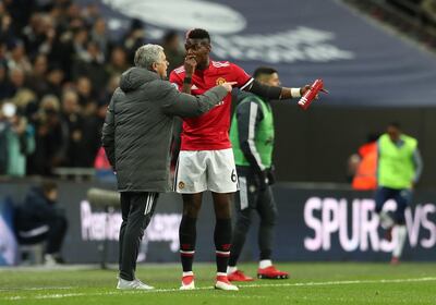 LONDON, ENGLAND - JANUARY 31:  Paul Pogba of Manchester United speaks to Jose Mourinho, Manager of Manchester United during the Premier League match between Tottenham Hotspur and Manchester United at Wembley Stadium on January 31, 2018 in London, England.  (Photo by Catherine Ivill/Getty Images)