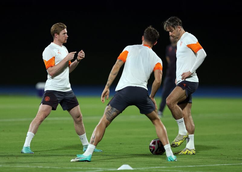 Manchester City's Kevin De Bruyne, left, trained with the team in Jeddah but won't be available for the Club World Cup final. Reuters