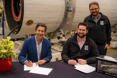 Andrew Bacon, right, and Space Forge co-founder Josh Western signed a launch agreement with Virgin Orbit in March. Photo: Virgin Orbit