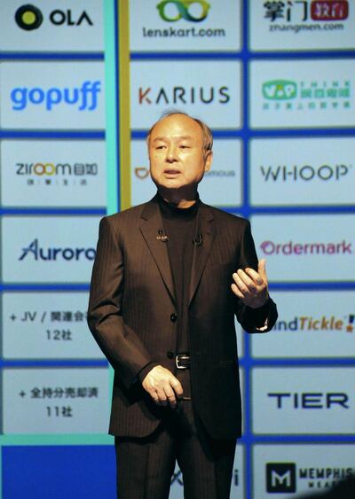 SoftBank Group Corp. Chairman and CEO Masayoshi Son speaks at a press conference in Tokyo on May 12, 2021. The company said its net profit for the year ended March surged to 4.99 trillion yen ($46 billion), the highest level on record for a Japanese company. Kyodo via Reuters