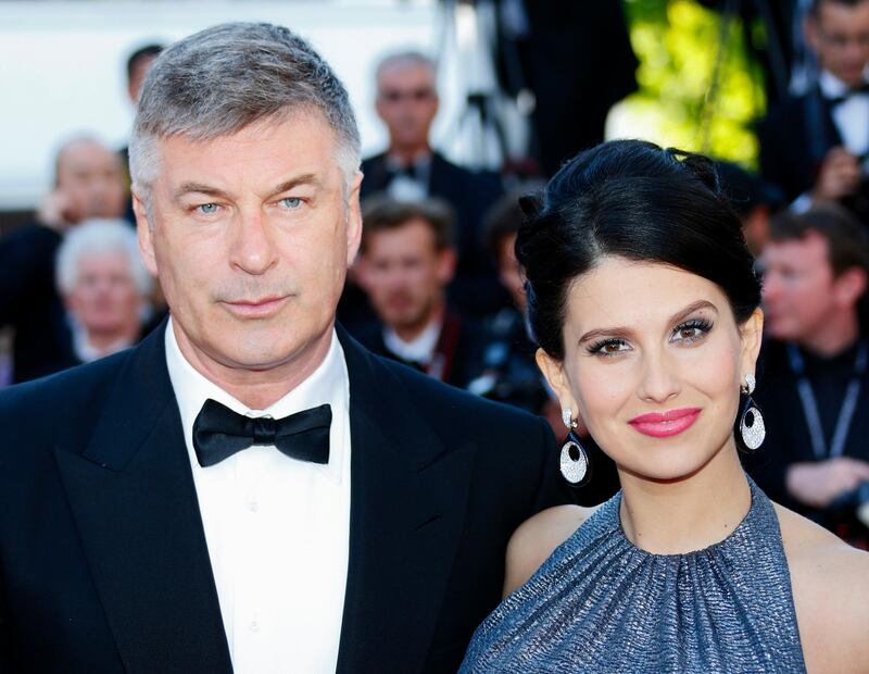 epa03709227 US actor Alec Baldwin (L) and Hilaria Thomas (R) arrive for the screening of 'Blood Ties' during the 66th annual Cannes Film Festival in Cannes, France, 20 May 2013. The movie is presented out of competition at the festival which runs from 15 to 26 May.  EPA/IAN LANGSDON