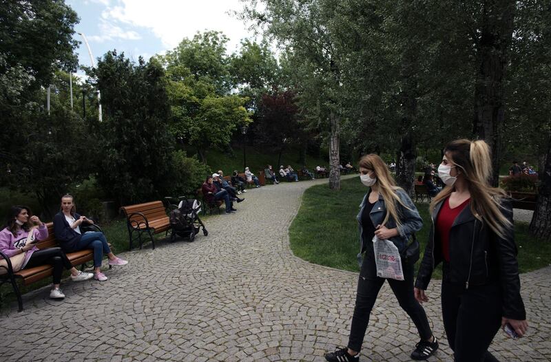 People visit Kugulu public garden, in Ankara, Turkey days after the government lifted a series of restrictions. AP Photo