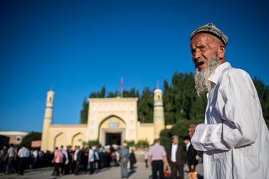 A Muslim man arriving in front of the Id Kah Mosque for the morning prayer on Eid al-Fitr in the old town of Kashgar in China's Xinjiang Uighur Autonomus Region. AFP