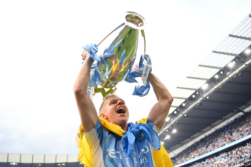 Oleksandr Zinchenko 7 - Emotional scenes at the Etihad as the Ukrainian draped his country's flag around the Premier League trophy. Underrated player who never grumbles about filling in at left-back despite being a midfielder by trade. Getty Images