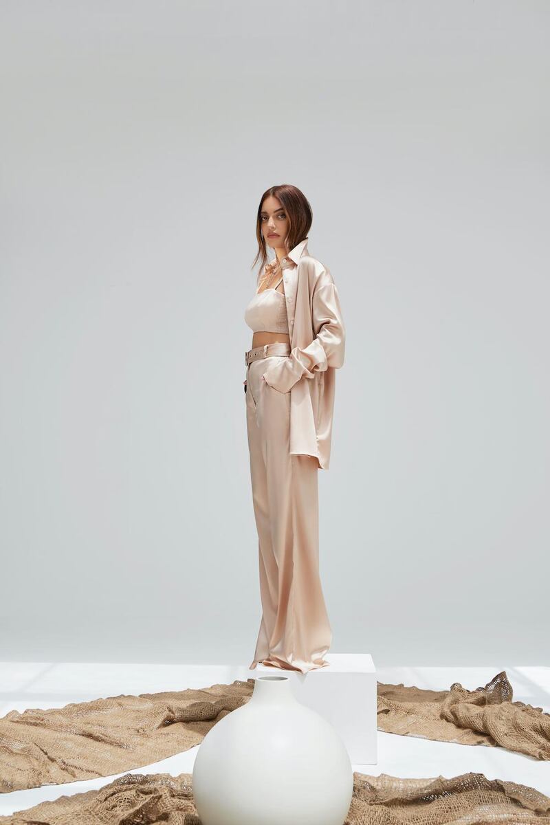 Oversized shirts and palazzo pants are key to the Madiyah Al Sharqi x Karen Wazen spring / summer 2021 collaboration. Courtesy Madiyah Al Sharqi