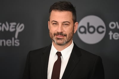 FILE - This May 14, 2019 file photo shows Jimmy Kimmel at the Walt Disney Television 2019 upfront in New York. Kimmel will host a prime-time edition of â€œWho Wants To Be A Millionaireâ€ with stars as the contestants and winnings earmarked for their causes of choice. It will debut this spring on ABC. (Photo by Evan Agostini/Invision/AP, File)