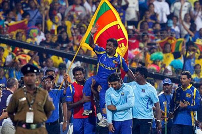Muttiah Muralitharan is held aloft by Sri Lankan players after his last game in the country on Tuesday – a semi-final victory over New Zealand in the World Cup. Next up is India today.
