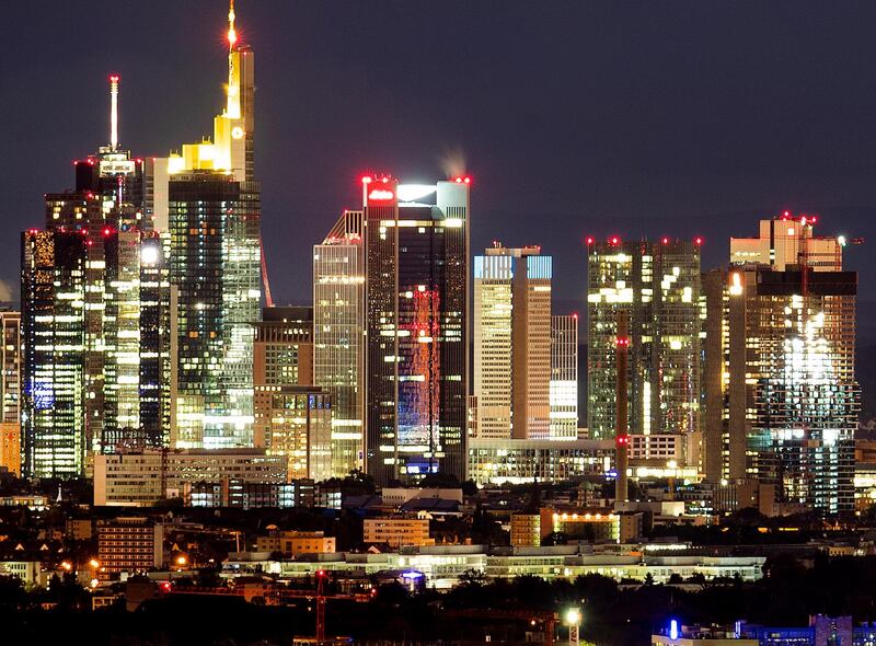 The buildings of the banking district are seen in Frankfurt, Germany, early Monday, Aug. 19, 2019. (AP Photo/Michael Probst)