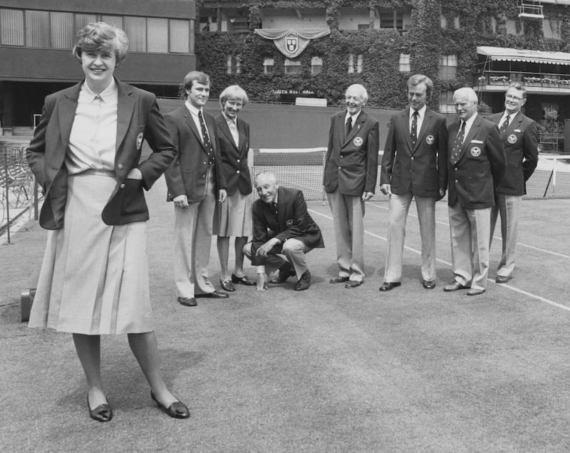 Chair umpire Jenny Higgs and the tournament umpires show off a new official uniform before the start of The Championships in 1981.