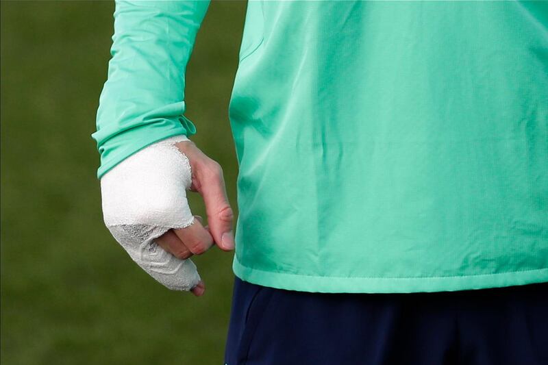 Real Madrid's Gareth Bale's right hand is bandaged as he takes part in the session at the team's Valdebebas training ground in Madrid. AP