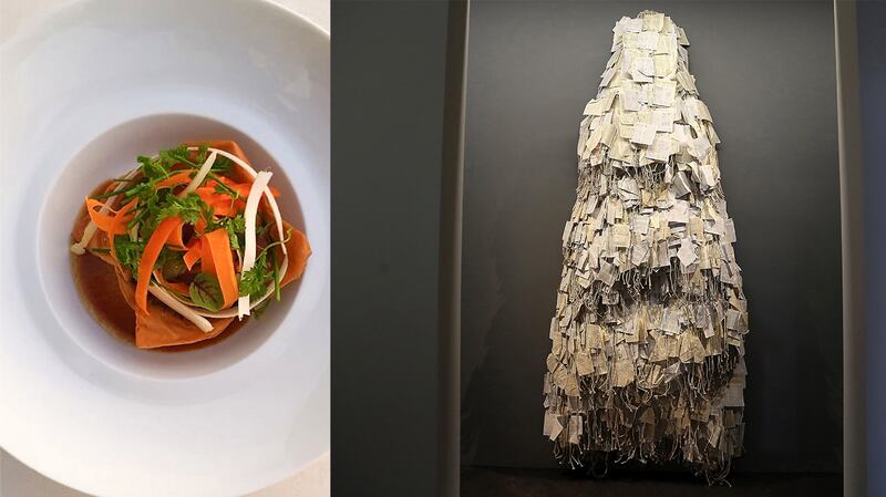 The dish is topped with shreds of spring vegetables, which call to mind Hassan Sharif’s 'Dictionary', an installation comprising thousands of pages glued to pieces of rope draped in a conical structure. Photos: Fouquet's Abu Dhabi; Pawan Singh / The National  