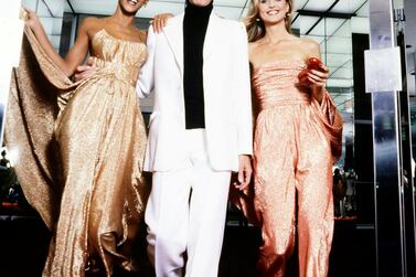 Fashion designer Halston with Halstonette's Alva Chinn and Chris Royer, wearing eveningwear from his 1978 resort collection.  Courtesy Penske Media