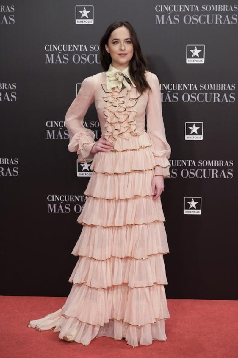 Dakota Johnson wears Gucci to the Fifty Shades Darker premiere in Madrid. Courtesy of Gucci by IPA
