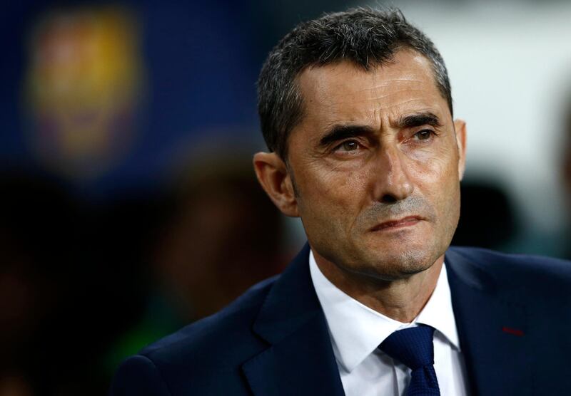 FC Barcelona's coach Ernesto Valverde looks on prior of the Spanish La Liga soccer match between FC Barcelona and Girona at the Camp Nou stadium in Barcelona, Spain, Sunday, Sept. 23, 2018. (AP Photo/Manu Fernandez)