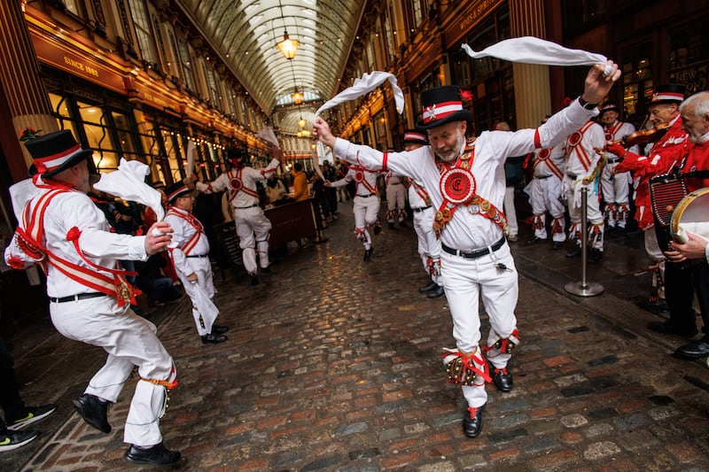 Morris dancing at Leadenhall Market to celebrate St George's Day in central London. PA