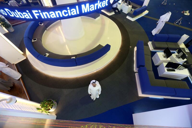 An Investor looks at the screen at the Dubai International Financial Market in Dubai, United Arab Emirates. Reuters