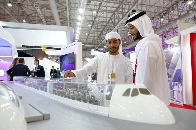 Dubai, United Arab Emirates - November 14th, 2017: Visitors look at a open top model of an Airbus A380 at the Dubai airshow. Tuesday, November 14th, 2017 at Al Maktoum Airport, Dubai. Chris Whiteoak / The National