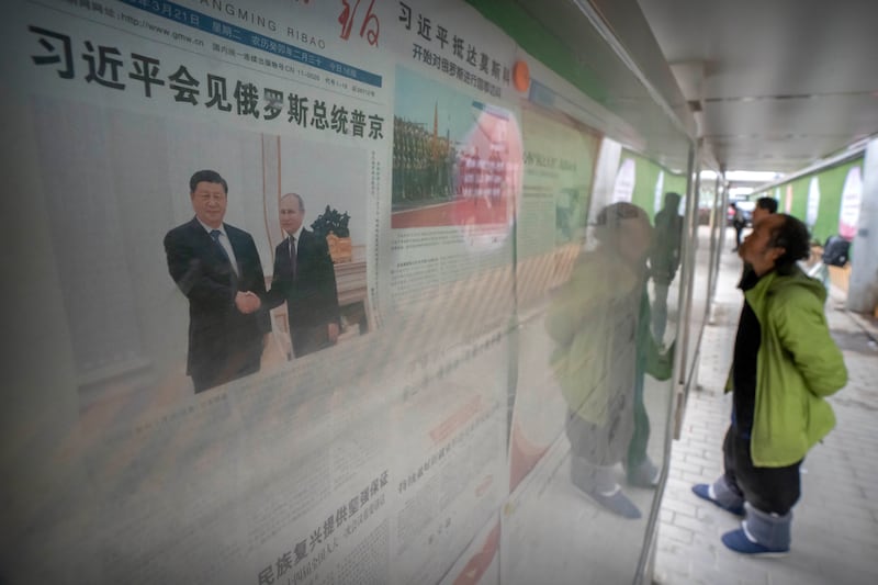 Mr Xi's visit to Russia made big headlines in Beijing. AP