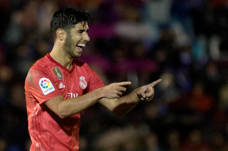 Real Madrid's Spanish midfielder Marco Asensio celebrates his goal against Melilla. AFP