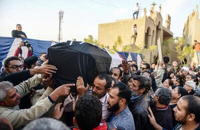 Pallbearers carry a victim of the Coptic Christian cathedral bomb in Cairo on December 12, 2016. ISIL claimed responsibility. Mohamed Hossam / EPA