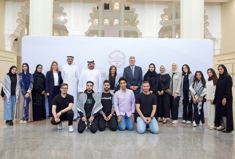 Sheikha Bodour bint Sultan Al Qasimi, president of the American University of Sharjah, with students who raised funds for Gaza. Photo: Sheikha Bodour / X