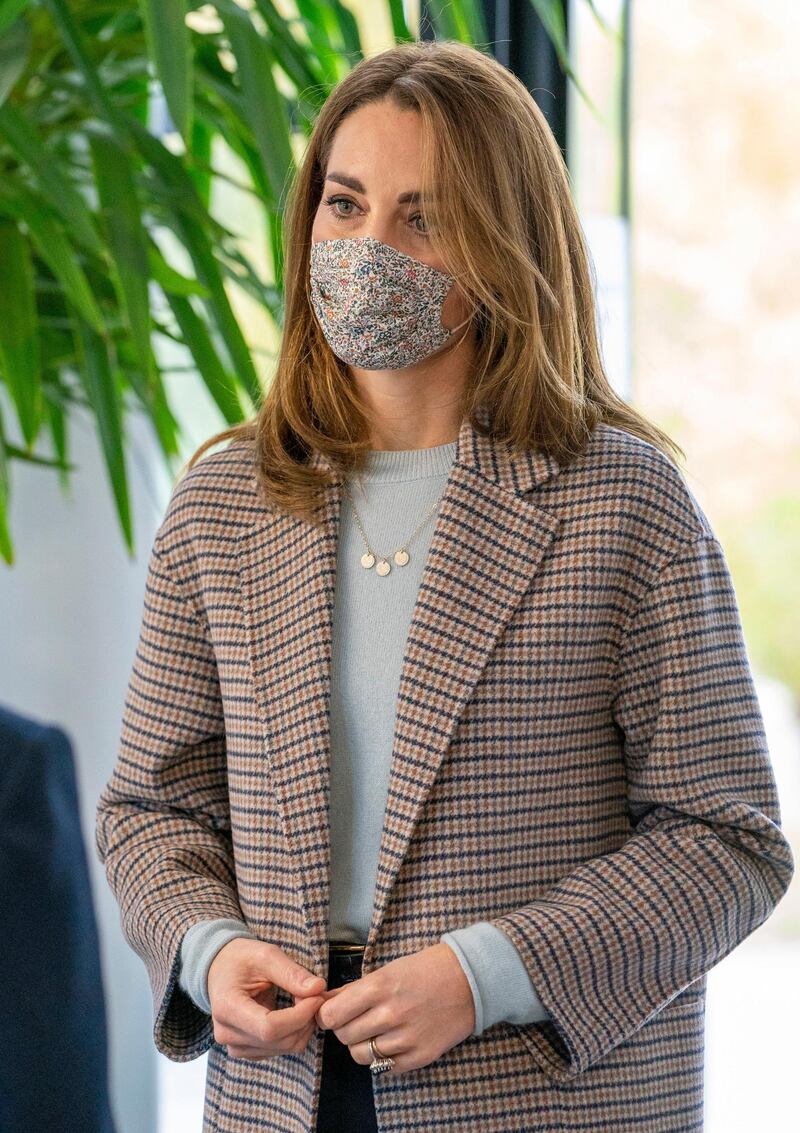 The Duchess of Cambridge wears a mask from Amaia Kids for a royal engagement at the University of Derby. AP