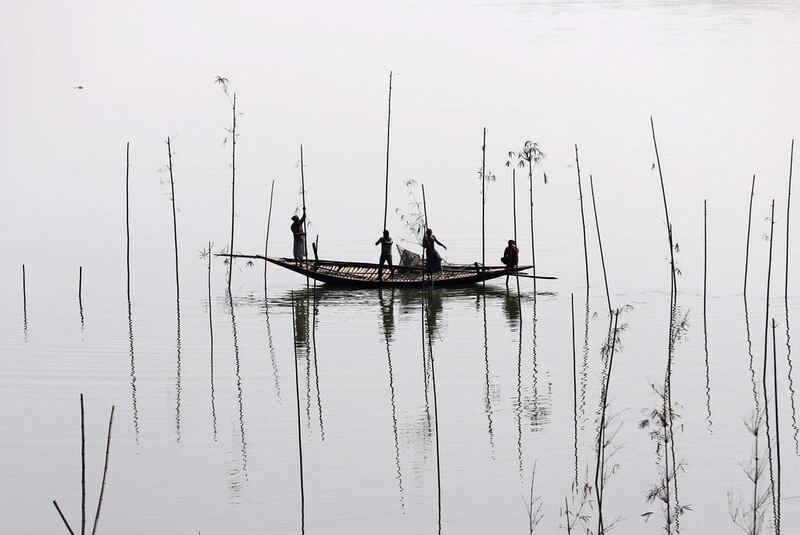 Fishermen in Dhaka, Bangladesh. Mohammad Ponir Hossain / Reuters