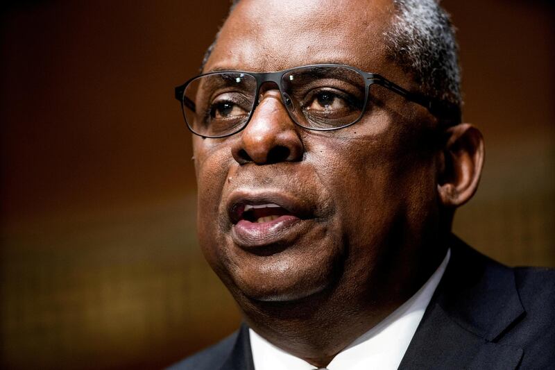 FILE PHOTO: Retired General Lloyd Austin testifies before the Senate Armed Services Committee during his confirmation hearing to be the next Secretary of Defense in the Dirksen Senate Office Building in Washington, U.S. January 19, 2021. Jim Lo Scalzo/Pool via REUTERS/File Photo