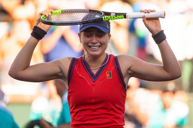 Paula Badosa, of Spain, holds up her racket after defeating Victoria Azarenka, of Belarus. AP Photo