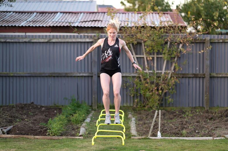 CHRISTCHURCH, NEW ZEALAND - APRIL 05: New Zealand middle-distance runner Angie Petty training in isolation in her backyard on April 05, 2020 in Christchurch, New Zealand. New Zealand has been in lockdown since Thursday 26 March following tough restrictions imposed by the government to stop the spread of COVID-19 across the country.  A State of National Emergency is in place along with an Epidemic Notice to help ensure the continuity of essential Government business. Under the COVID-19 Alert Level Four measures, all non-essential businesses are closed, including bars, restaurants, cinemas and playgrounds. Schools are closed and all indoor and outdoor events are banned. Essential services will remain open, including supermarkets and pharmacies. Lockdown measures are expected to remain in place for around four weeks, with Prime Minister Jacinda Ardern warning there will be zero tolerance for people ignoring the restrictions, with police able to enforce them if required. (Photo by Kai Schwoerer/Getty Images)