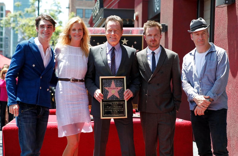 Actor Bryan Cranston (C) poses with co-stars from his series "Breaking Bad" (L-R) RJ Mitte, Anna Gunn, Aaron Paul and Bob Odenkirk during ceremonies to unveil his star on the Hollywood Walk of Fame in Hollywood July 16, 2013. Cranston stars in the AMC drama series "Breaking Bad." REUTERS/Fred Prouser 
(UNITED STATES - Tags: ENTERTAINMENT) *** Local Caption ***  LAB07_USA-_0716_11.JPG