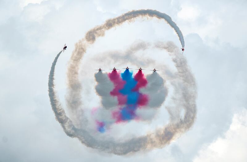 The Red Arrows, the British RAF's aerobatic team, in formation at the Danish Air Show at Karup Airport. EPA