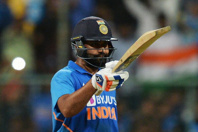 India's Rohit Sharma celebrates his century in the third ODI against Australia in Bangalore. AFP