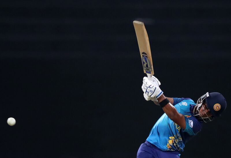 Sri Lanka's Chamari Athapaththu smashes a boundary on her way to a score of 102 runs off 63 deliveries before she was out caught off the bowling of Scotland's Rachel Slater.