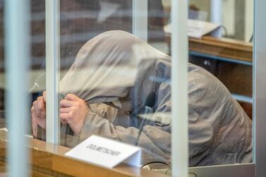 Defendant Eyad Al Gharib, accused of crimes against humanity as a member of Syrian President Bashar Al Assad's security services, sits in court at the start of his trial in Koblenz, Germany on April 23, 2020. via Reuters