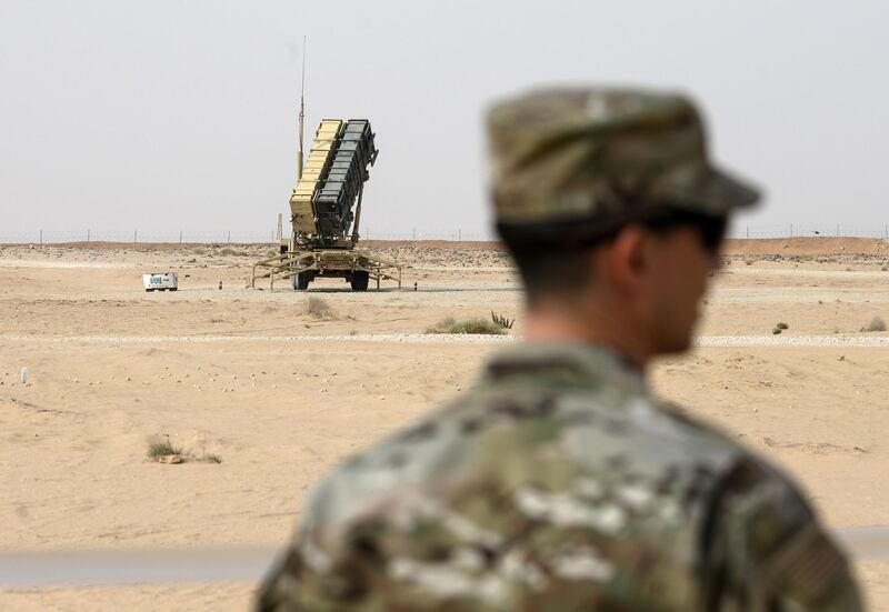 (FILES) In this file photo taken on February 20, 2020 a member of the US Airforce looks on near a Patriot missile battery at the Prince Sultan air base in Al-Kharj, in central Saudi Arabia. The US is pulling out four of its powerful Patriot missile systems from Saudi Arabia, after determining the threat from Iran that sparked an arms buildup in the region last year had waned, a Defense Department official said May 7, 2020. / AFP / ANDREW CABALLERO-REYNOLDS
