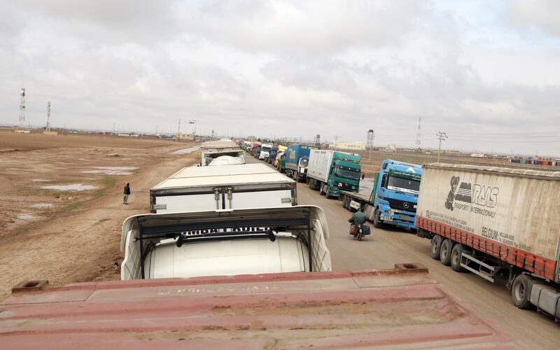 Fuel tankers and trucks are parked on the road at the Islam Qala border with Iran, in Herat Province, west of Kabul, Afghanistan.  A fuel tanker exploded at the Islam Qala crossing in Afghanistan's western Herat province on the Iranian border, injuring at least seven people and causing a massive fire that consumed more than 500 trucks carrying natural gas and fuel, according to Afghan officials and Iranian state media. AP