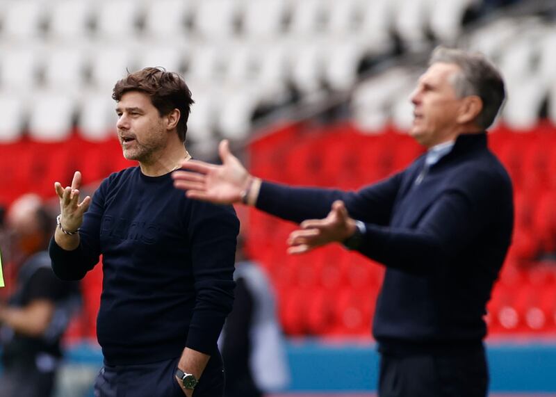 Saint Etienne manager Claude Puel, right, and his PSG counterpart Mauricio Pochettino. Reuters