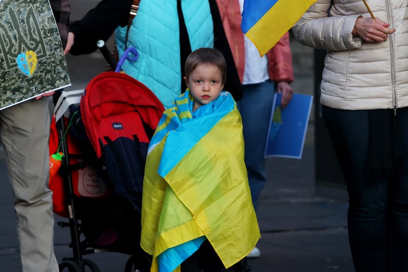Ukrainians young and old gather at Circular Quay in Sydney. Getty Images