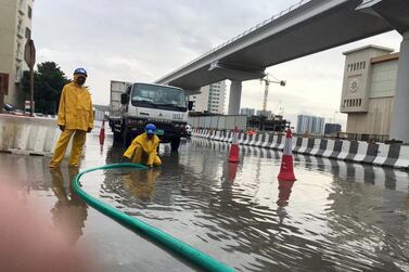 Some roads were left flooded by downpours. Leslie Pableo / The National