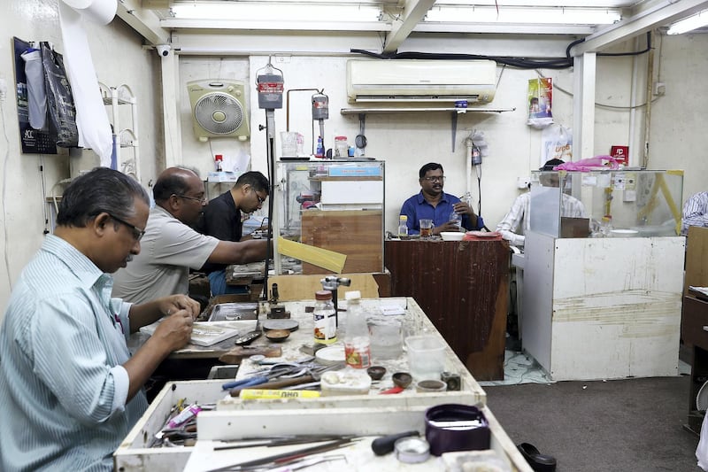 SHARJAH , UNITED ARAB EMIRATES , NOV 1   – 2017 :- Workers making the silver and gold jewellery at the Al Baroon Gold Factory in the Al Mareija area near the Heritage area in Sharjah. They are in the jewellery business for the last 30 years. (Pawan Singh / The National) For Weekend