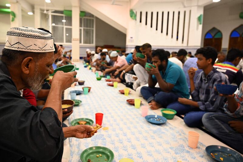 The faithful break their fast during Ramadan in Colombo, Sri Lanka. AFP