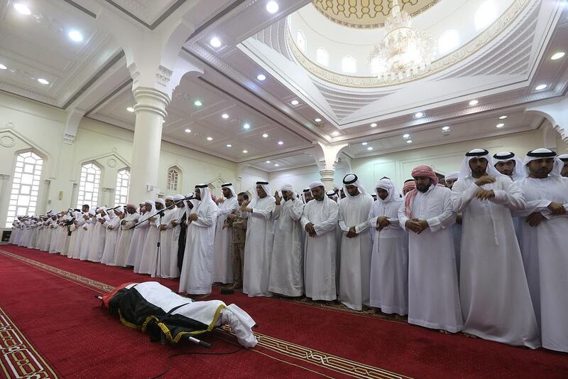 Sheikh Saud bin Saqr Al Qasimi, Ruler of RAK, attends funeral prayers for Lt Rashid Ahmed Abdullah Al Habsi. Satish Kumar / The National