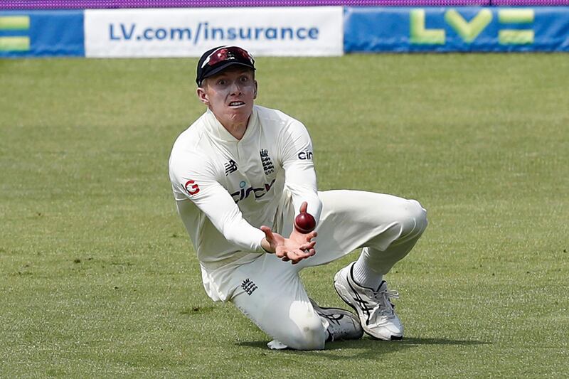 England fielder Zak Crawley takes a catch to dismiss New Zealand's Kyle Jamieson for nine. AFP