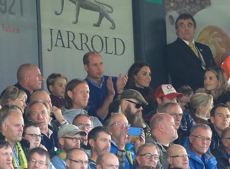 Prince George and Prince William are seen in the stands during the Premier League match between Norwich City and Aston Villa. Getty Images