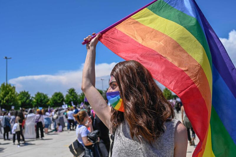 A rainbow flag is waved at a march in Istanbul to protest against Turkey's withdrawal from the Istanbul Convention safeguarding the rights of women. AFP