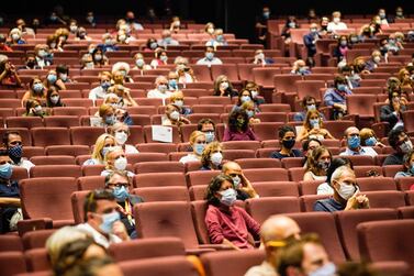 Spectators at a socially distanced screening of the docufilm 'Molecole', made in Venice during lockdown at the 77th annual Venice International Film Festival, on September 1, 2020. EPA