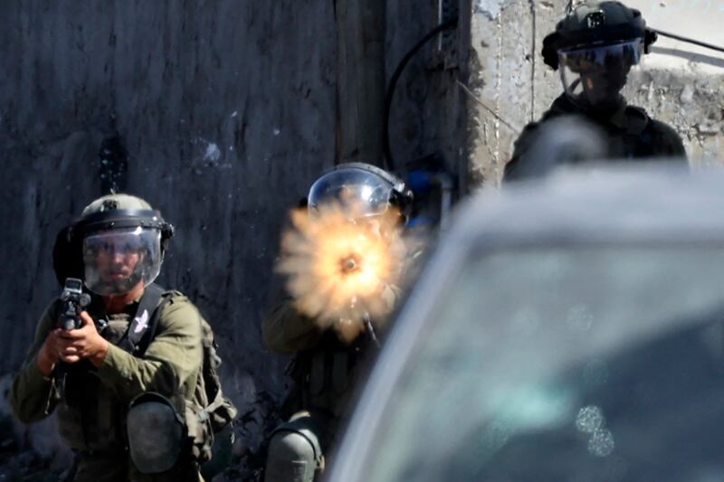 Israeli soldiers during clashes with Palestinian demonstrators after a protest against the expropriation of Palestinian land by Israel in the village of Kfar Qaddum in the occupied West Bank, near the Jewish settlement of Kedumim. AFP