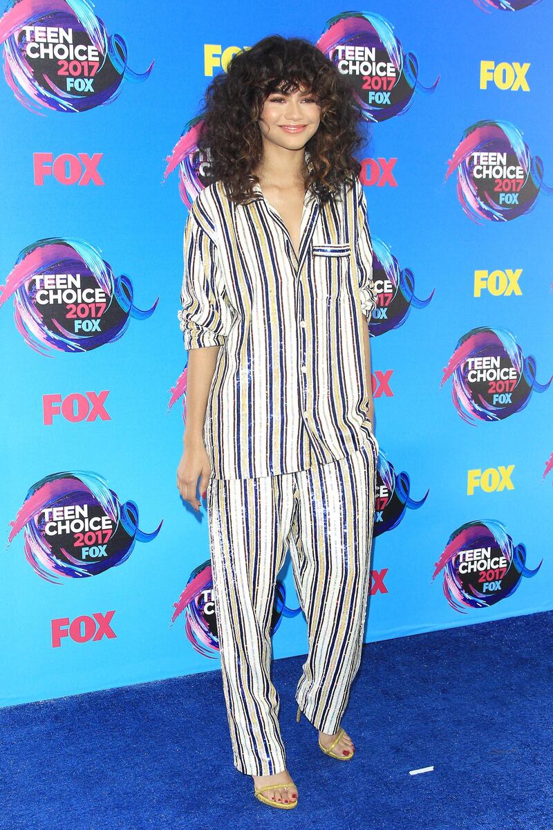 epa06143647 US actress/singer Zendaya arrives for the Teen Choice Awards 2017 at the Galen Center in Los Angeles, California, USA, 13 August 2017. The Teen Choice Awards celebrate teen icons in film, TV, music, sports, fashion and the web.  EPA/NINA PROMMER